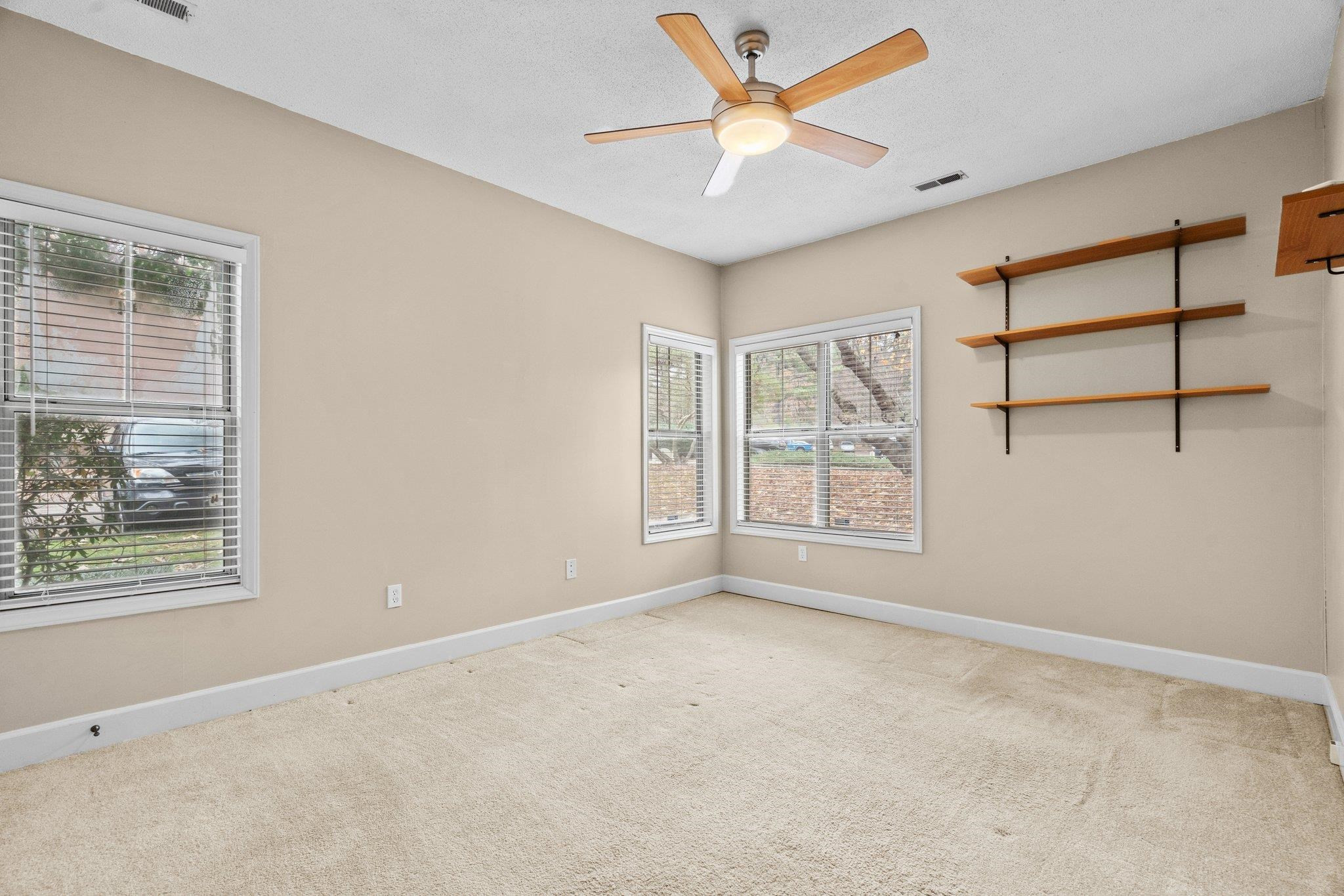 6121 Sunpointe Drive, Unit 103 Raleigh, NC 27606 - Photo 15 of 31 Master Bedroom
