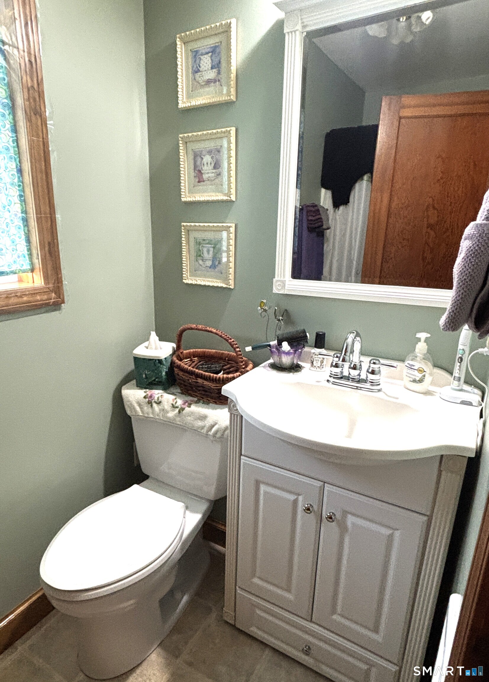 147 Halls Hill Road Colchester, CT 06415 - Photo 14 of 40 a bathroom with a sink and a toilet