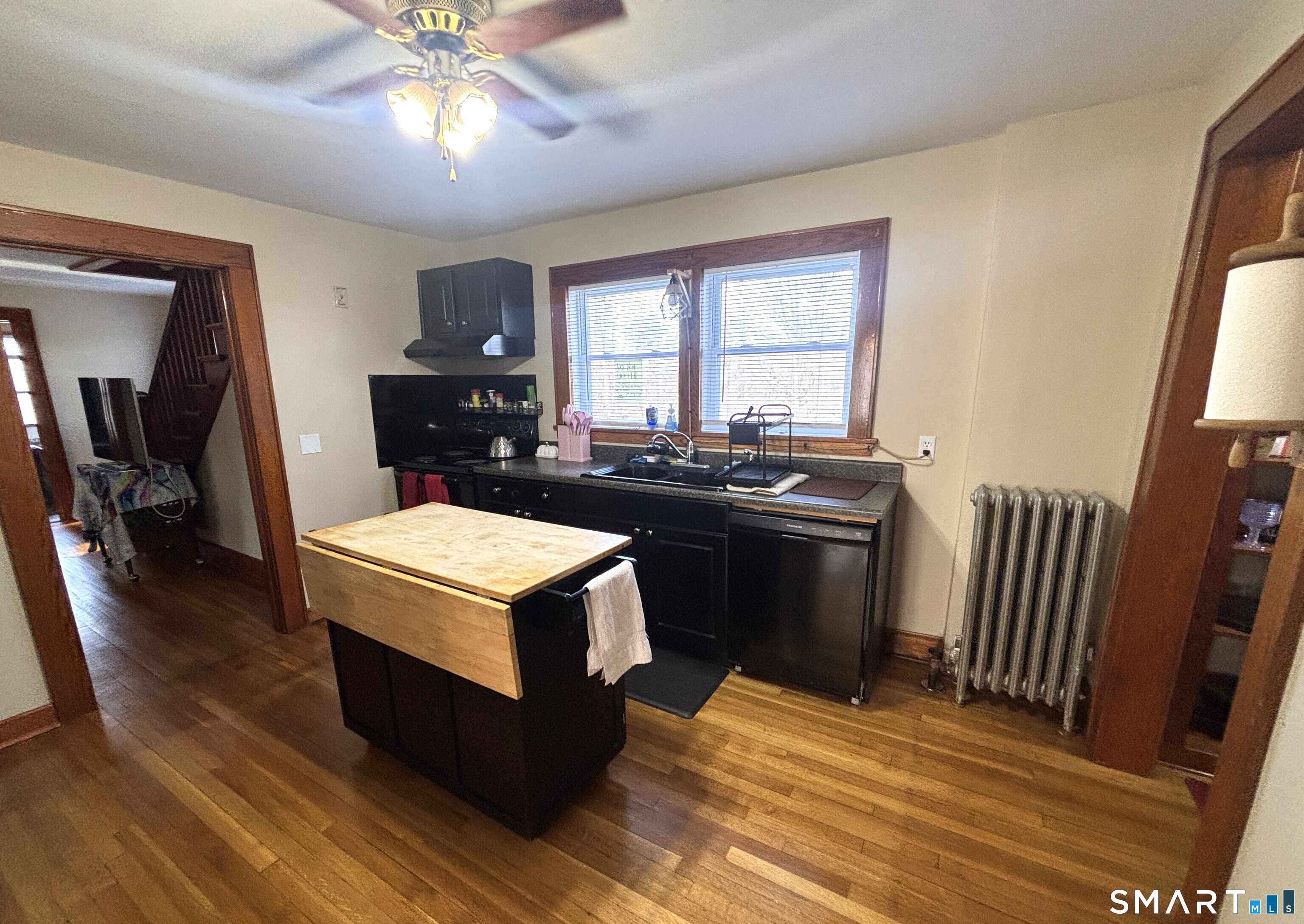 147 Halls Hill Road Colchester, CT 06415 - Photo 29 of 40 a kitchen with a stove and a refrigerator