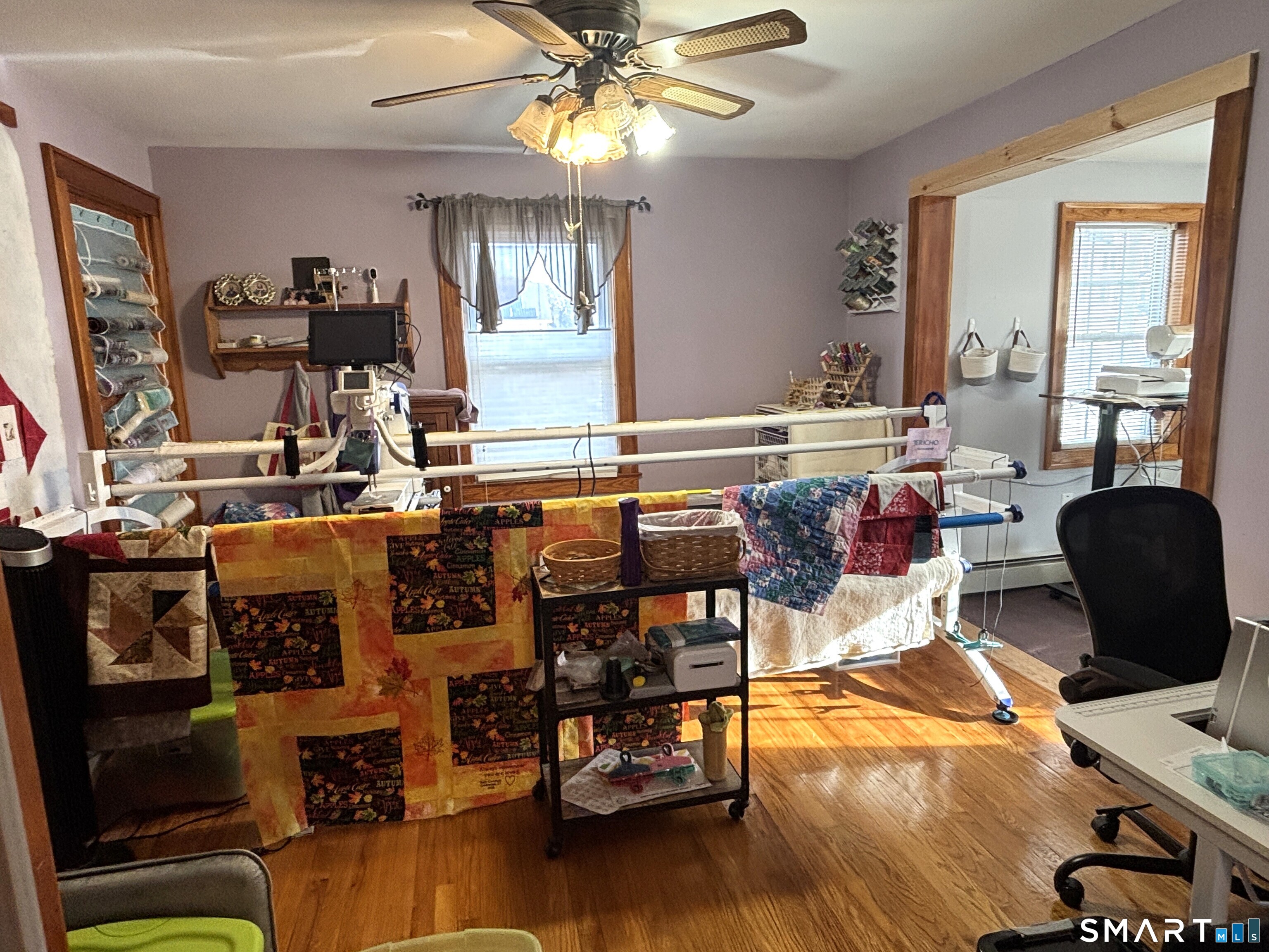 147 Halls Hill Road Colchester, CT 06415 - Photo 10 of 40 a view of a dining room with furniture window and wooden floor