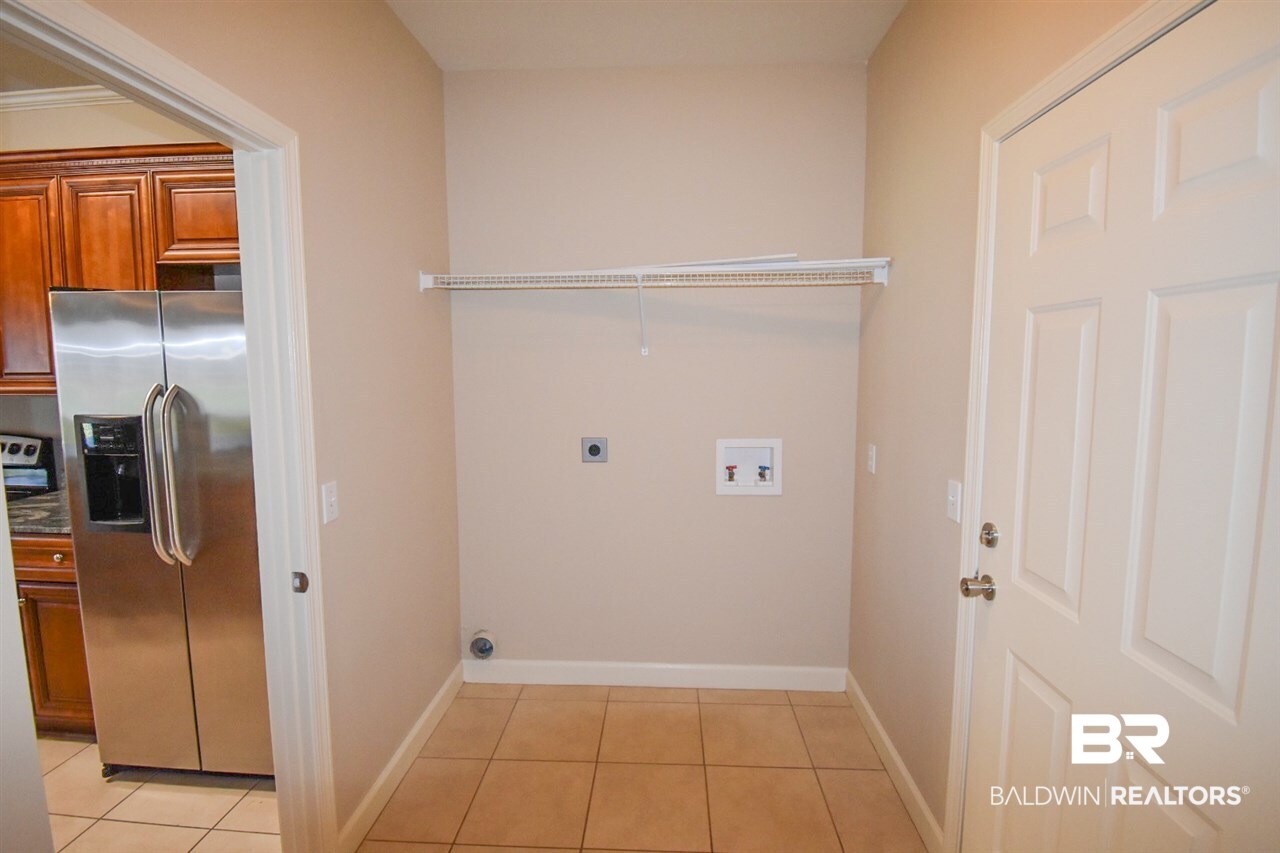 13708 Charmont Way Loxley, AL 36551 - Photo 8 of 16 Laundry Room