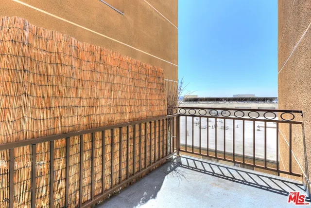 a view of a building from a balcony