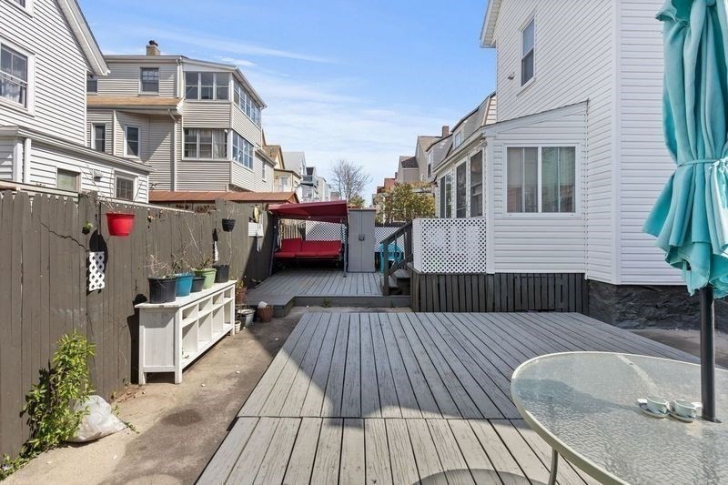 18 Baker Road Everett, MA 02149 - Photo 29 of 31 a view of a chairs on the roof deck