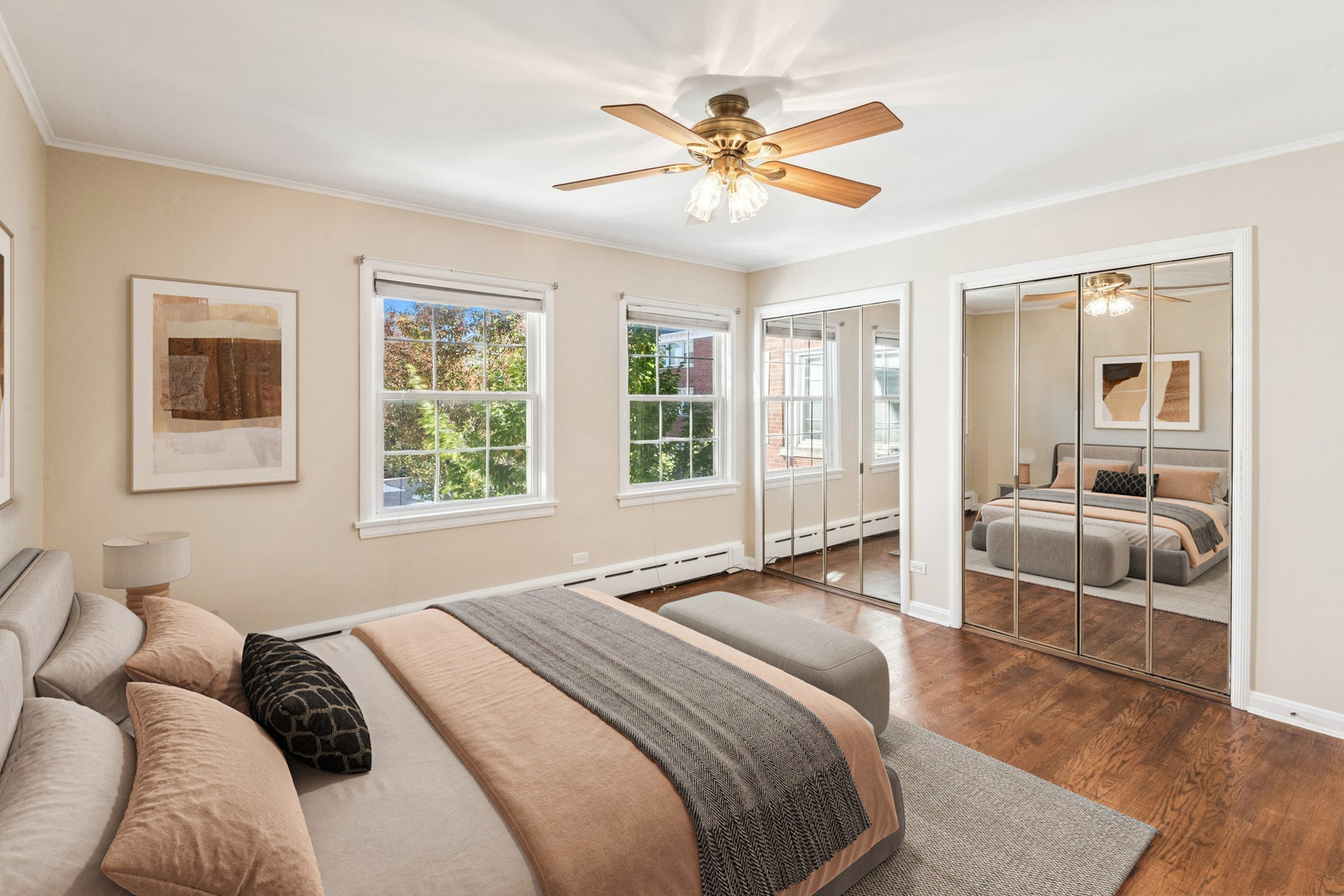 2252 Sherman Avenue, Unit 2 Evanston, IL 60201 - Photo 17 of 24 a bedroom with a large bed a chandelier and windows