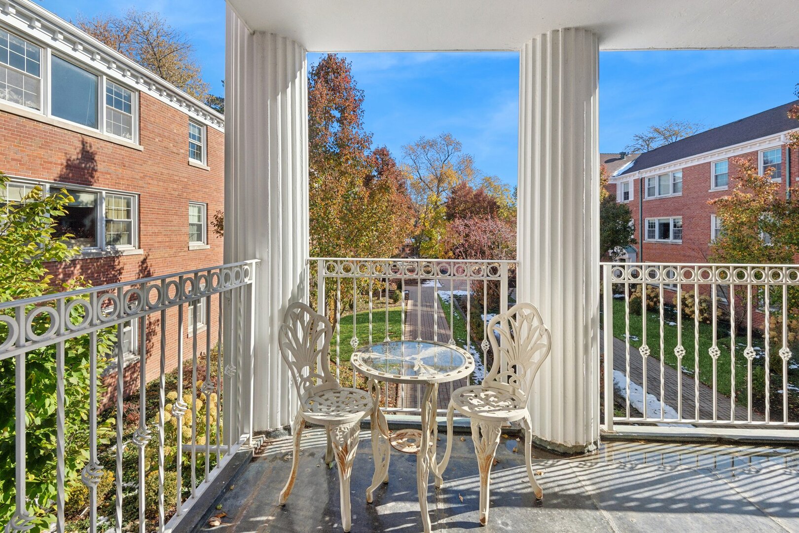 2252 Sherman Avenue, Unit 2 Evanston, IL 60201 - Photo 5 of 24 a balcony with table and chairs