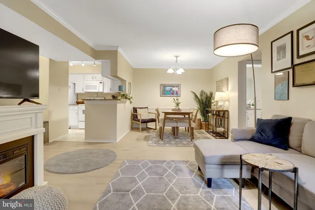 a kitchen with a refrigerator and cabinets