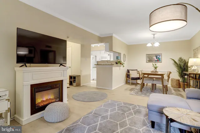 a kitchen with granite countertop cabinets stainless steel appliances and a sink