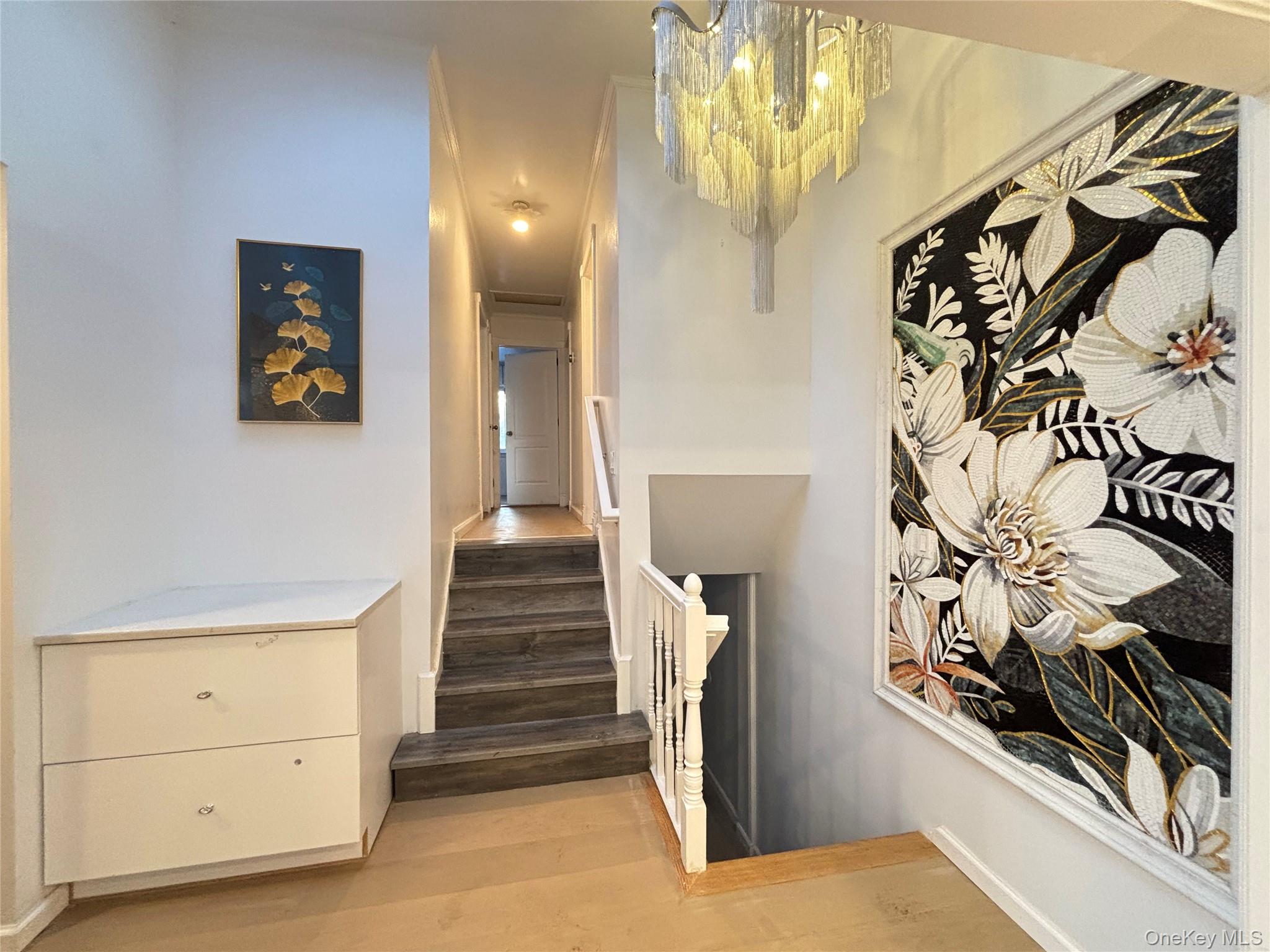 105 Seaman Road Jericho, NY 11753 - Photo 18 of 22 a view of a hallway with stairs