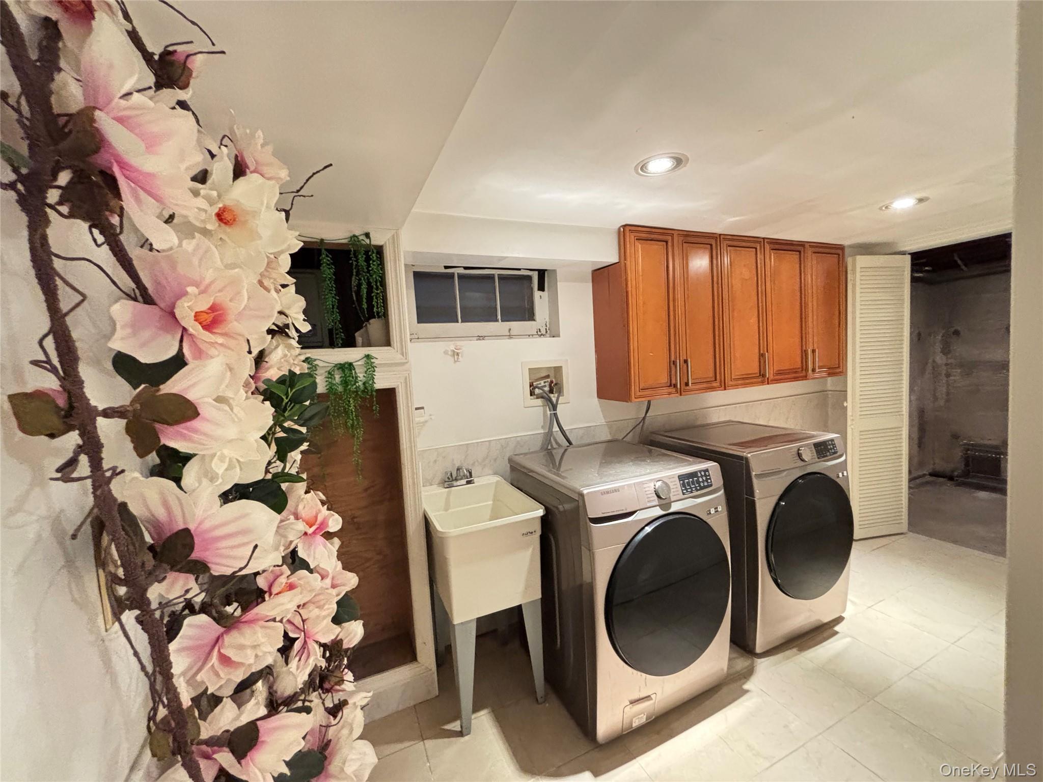 105 Seaman Road Jericho, NY 11753 - Photo 21 of 22 a utility room with dryer and washer