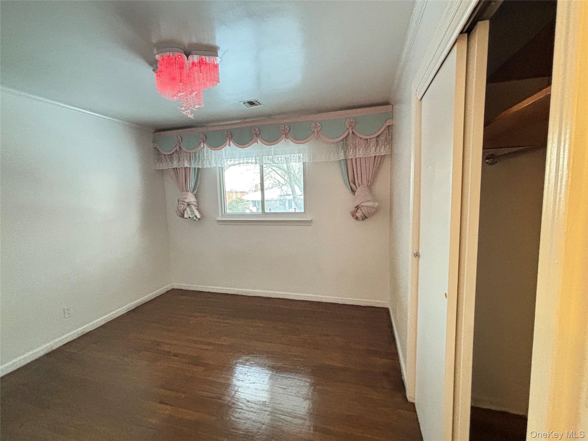 105 Seaman Road Jericho, NY 11753 - Photo 6 of 22 a view of an empty room