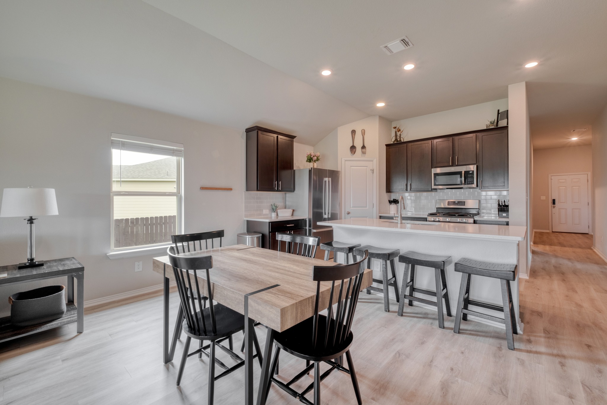 1000 Bright Star Cove Georgetown, TX 78628 - Photo 13 of 40 a view of kitchen with cabinets table and chairs