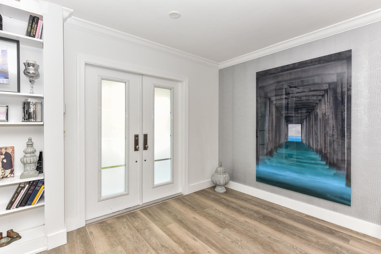 880 Hickory Terrace Boca Raton, FL 33486 - Photo 3 of 38 a view of a livingroom with wooden floor and closet