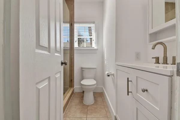 a bathroom with a sink and a toilet