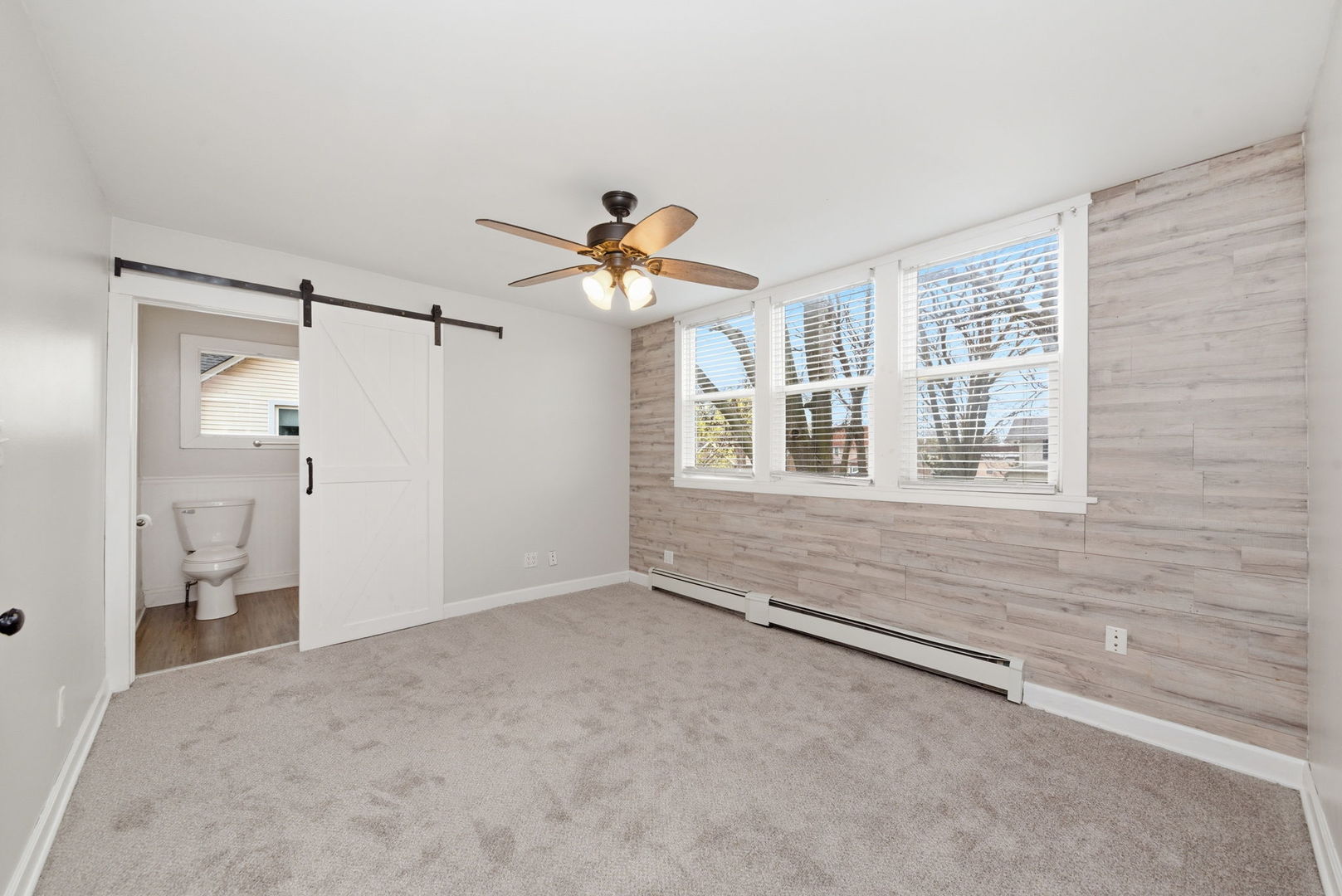 500 Catherine Street Ottawa, IL 61350 - Photo 12 of 23 wooden floor in an empty room with a window