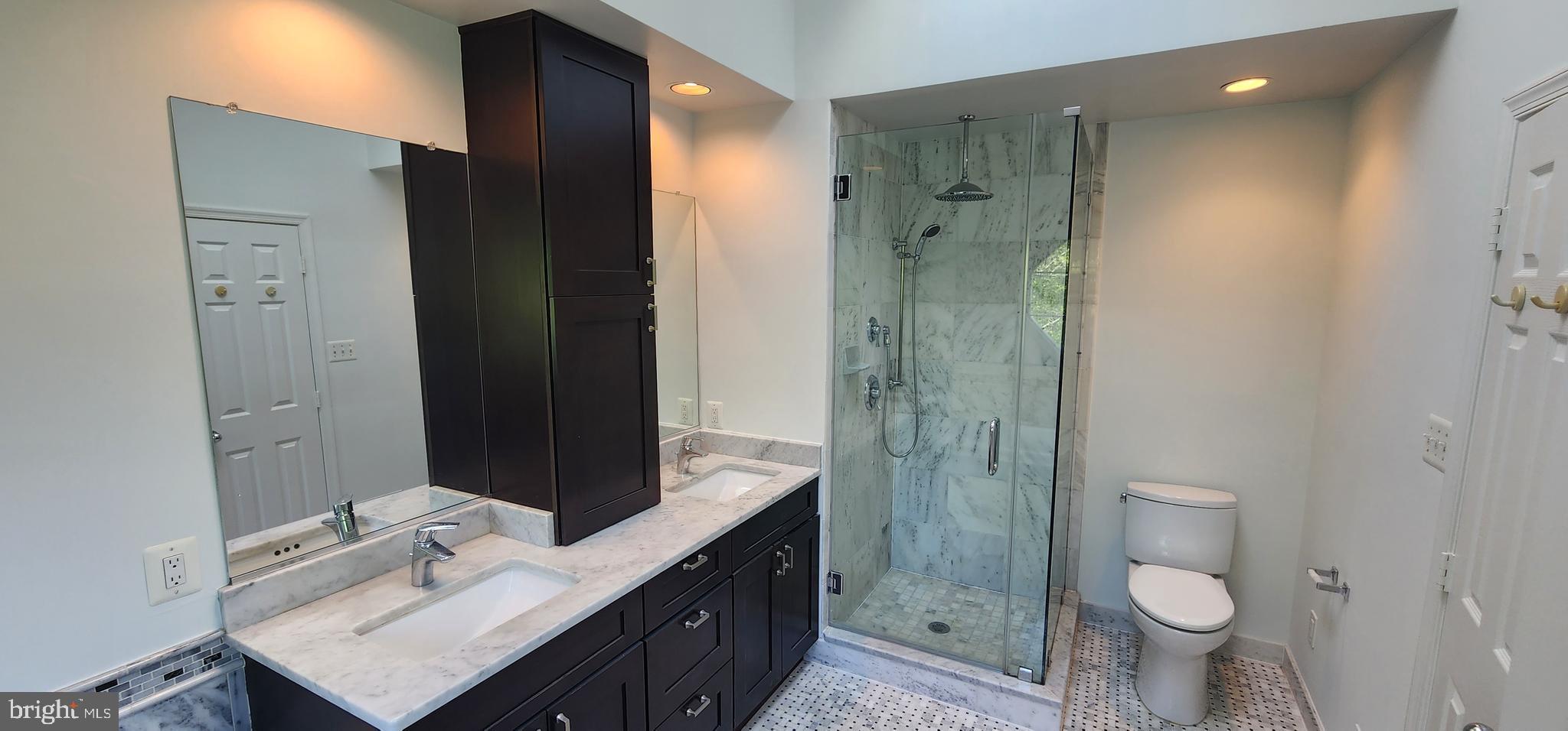 20320 Burnley Square Sterling, VA 20165 - Photo 12 of 22 a bathroom with a granite countertop sink toilet and shower