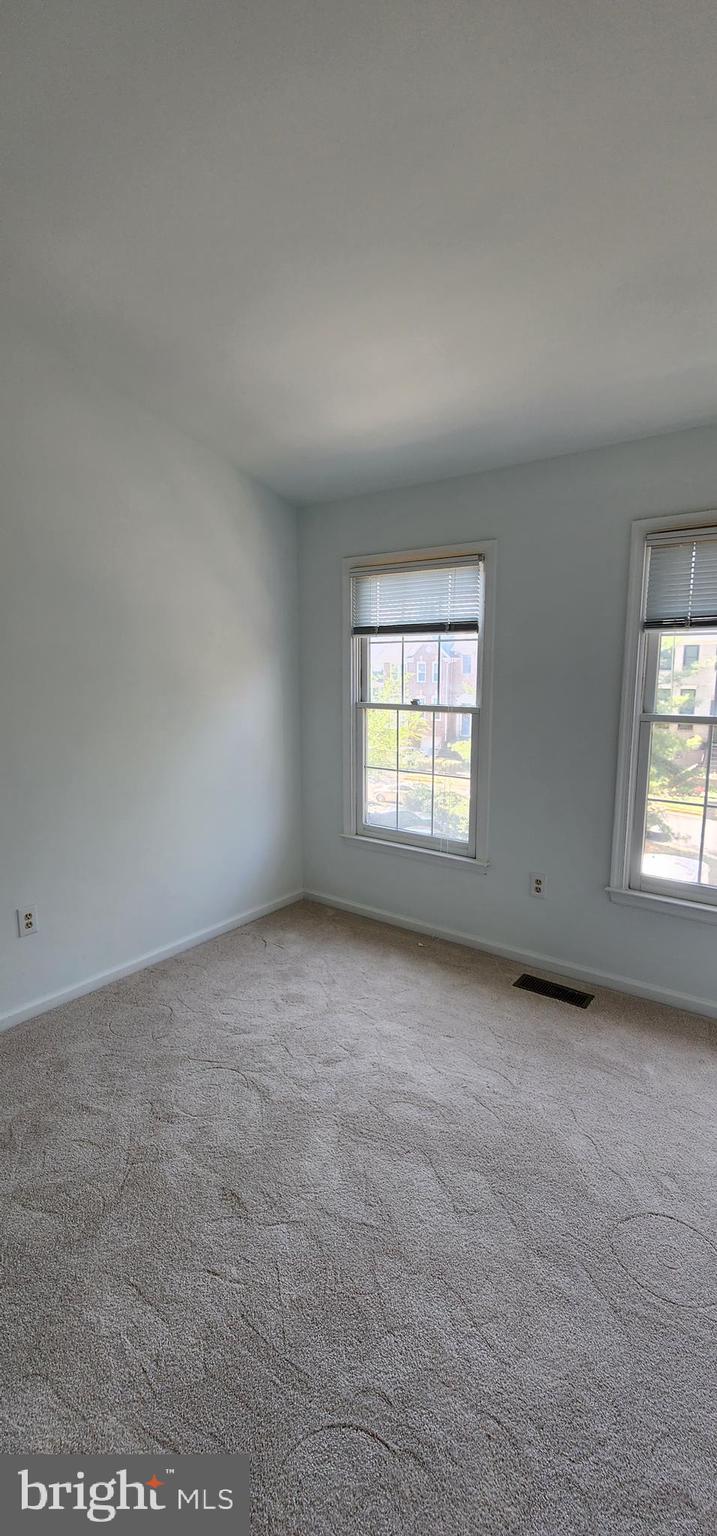 20320 Burnley Square Sterling, VA 20165 - Photo 18 of 22 an empty room with windows