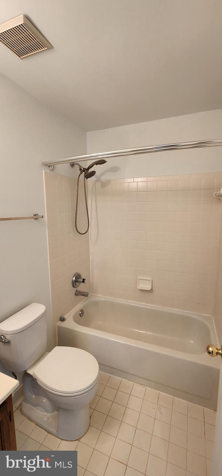 20320 Burnley Square Sterling, VA 20165 - Photo 19 of 22 a bathroom with a toilet and a shower