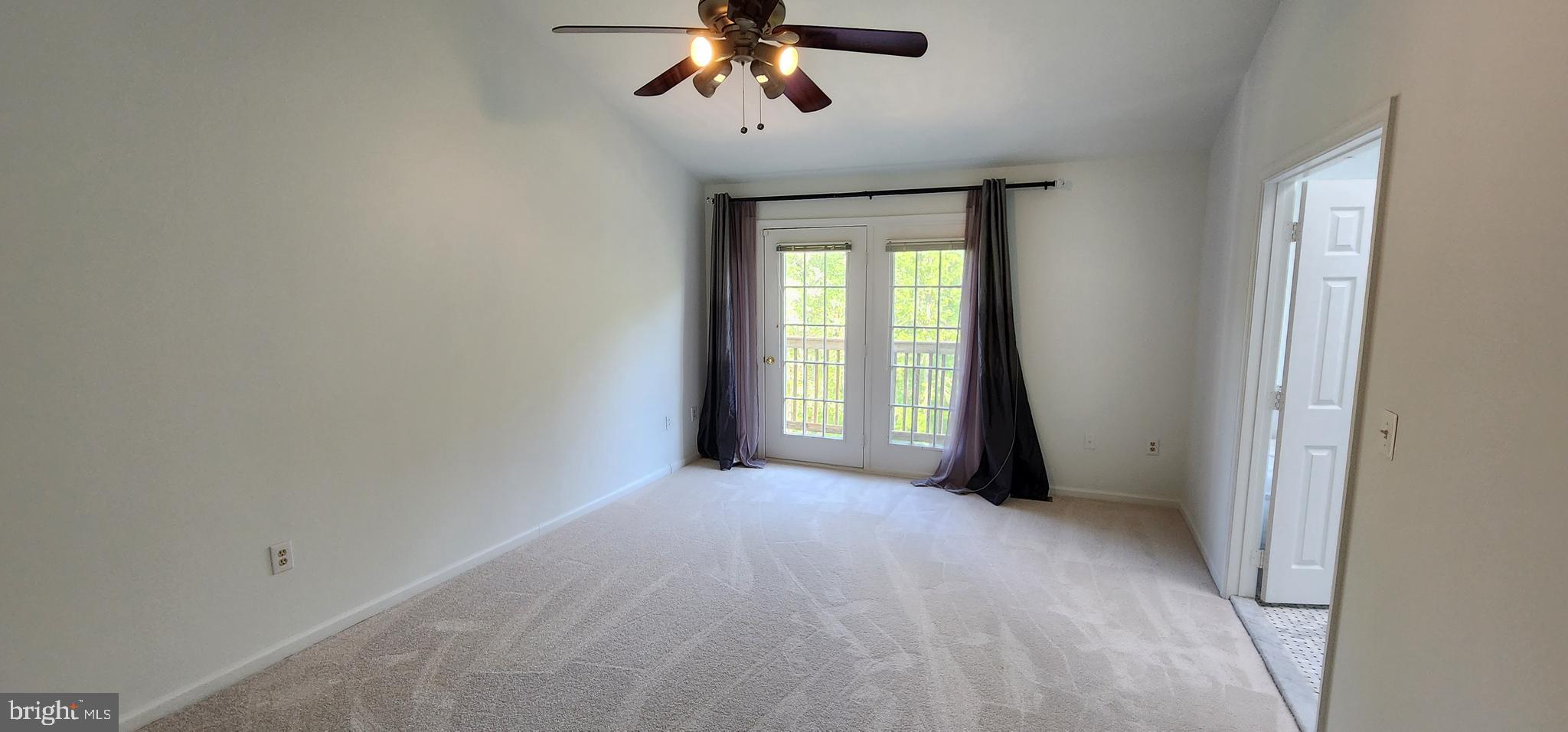 20320 Burnley Square Sterling, VA 20165 - Photo 10 of 22 a view of an empty room with a window