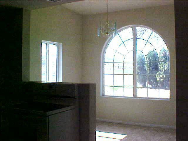 3112 South Wiley Road Yakima, WA 98903 - Photo 2 of 7 a view of an empty room with a window