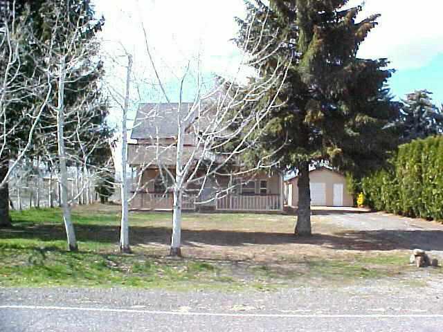 3112 South Wiley Road Yakima, WA 98903 - Photo 5 of 7 a view of a house with a yard