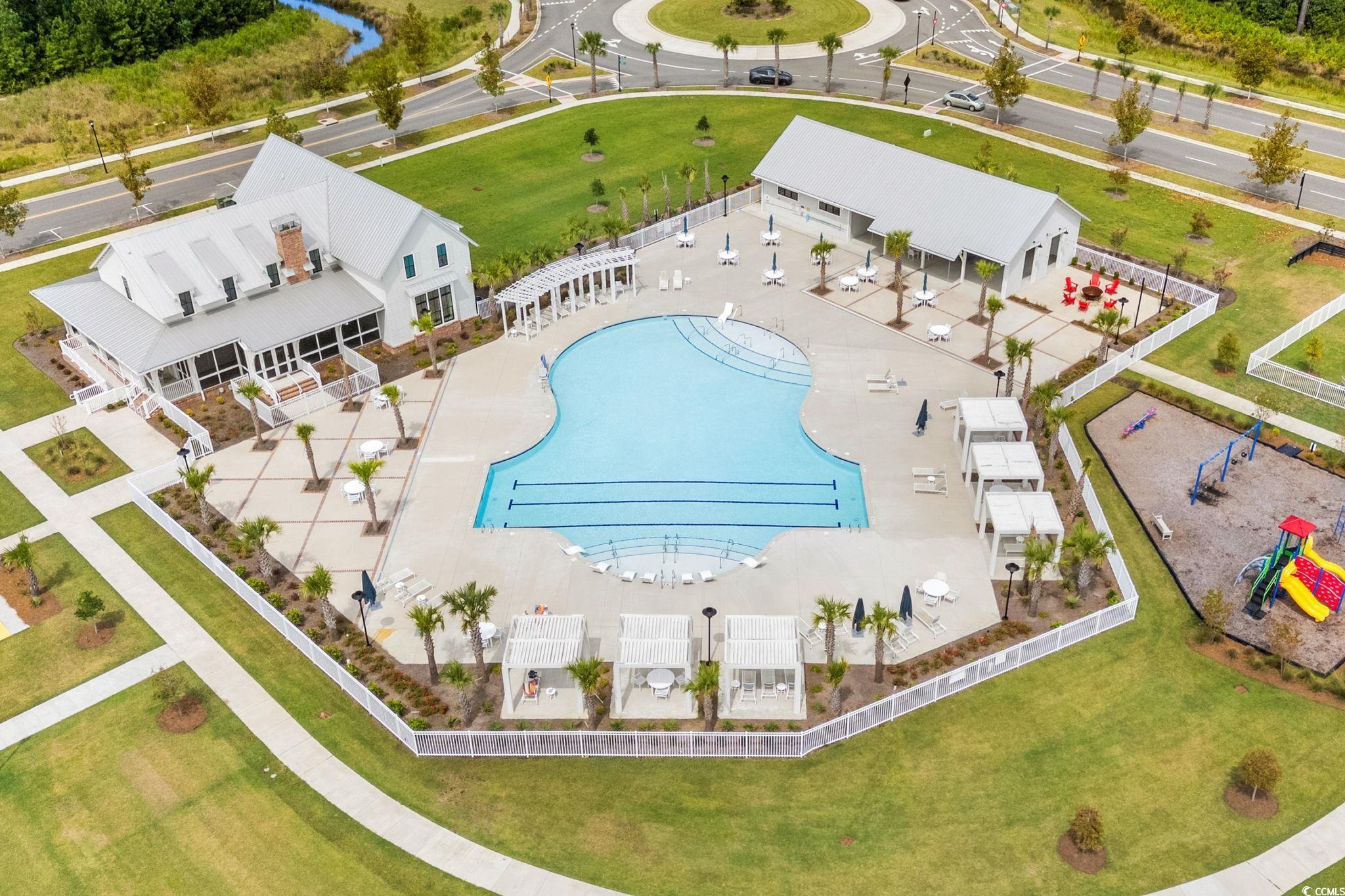 477 Ayrhill Loop Myrtle Beach, SC 29588 - Photo 32 of 39 Bird's eye view of a pool area