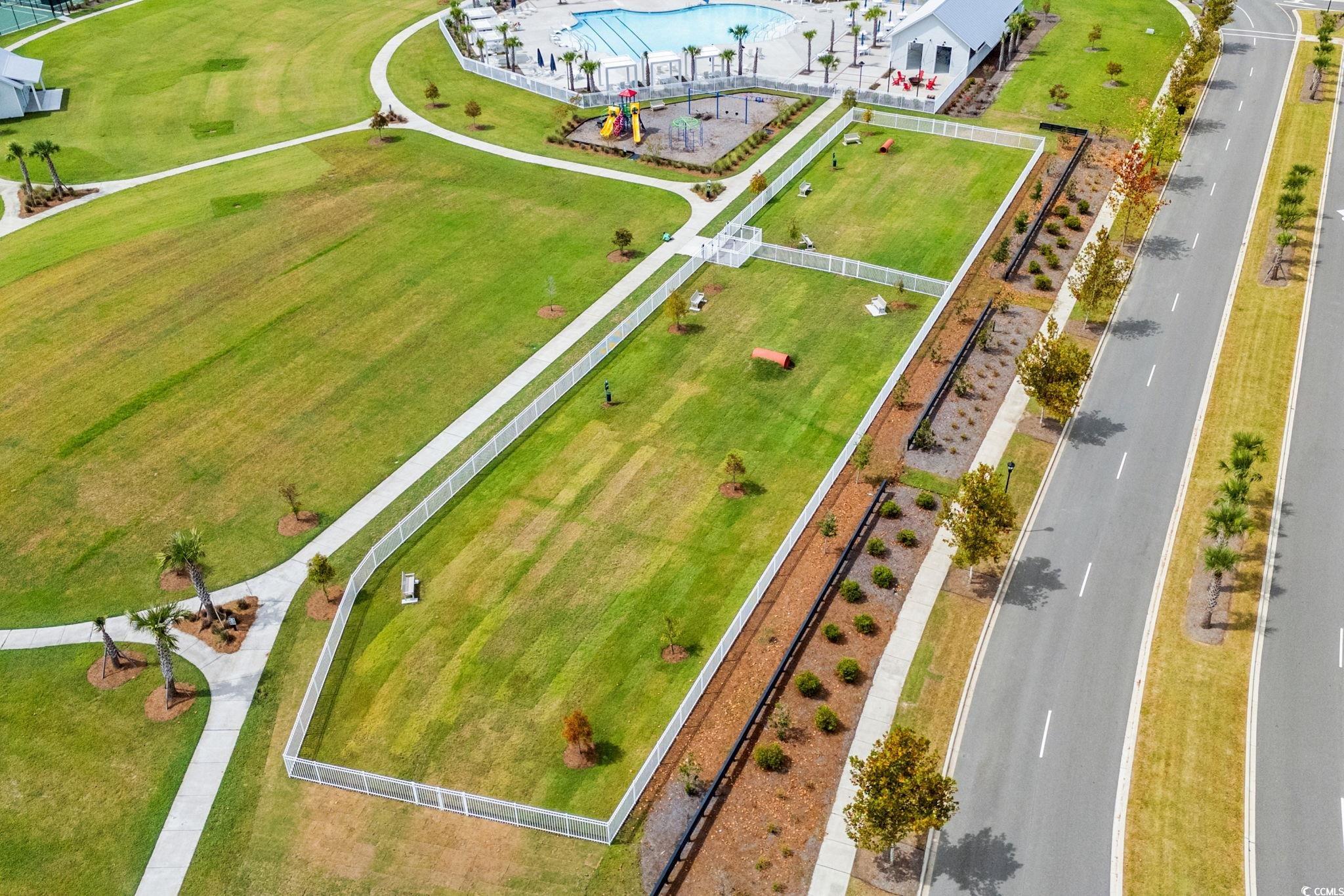 477 Ayrhill Loop Myrtle Beach, SC 29588 - Photo 34 of 39 Bird's eye view of a pool area
