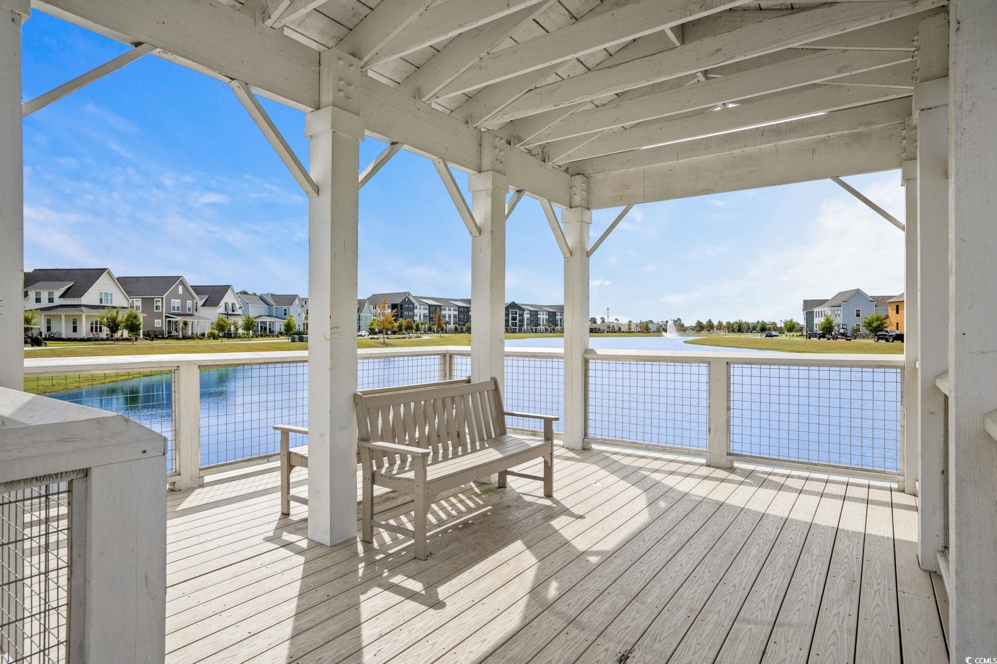477 Ayrhill Loop Myrtle Beach, SC 29588 - Photo 36 of 39 Dock featuring a deck with water view and a residential view