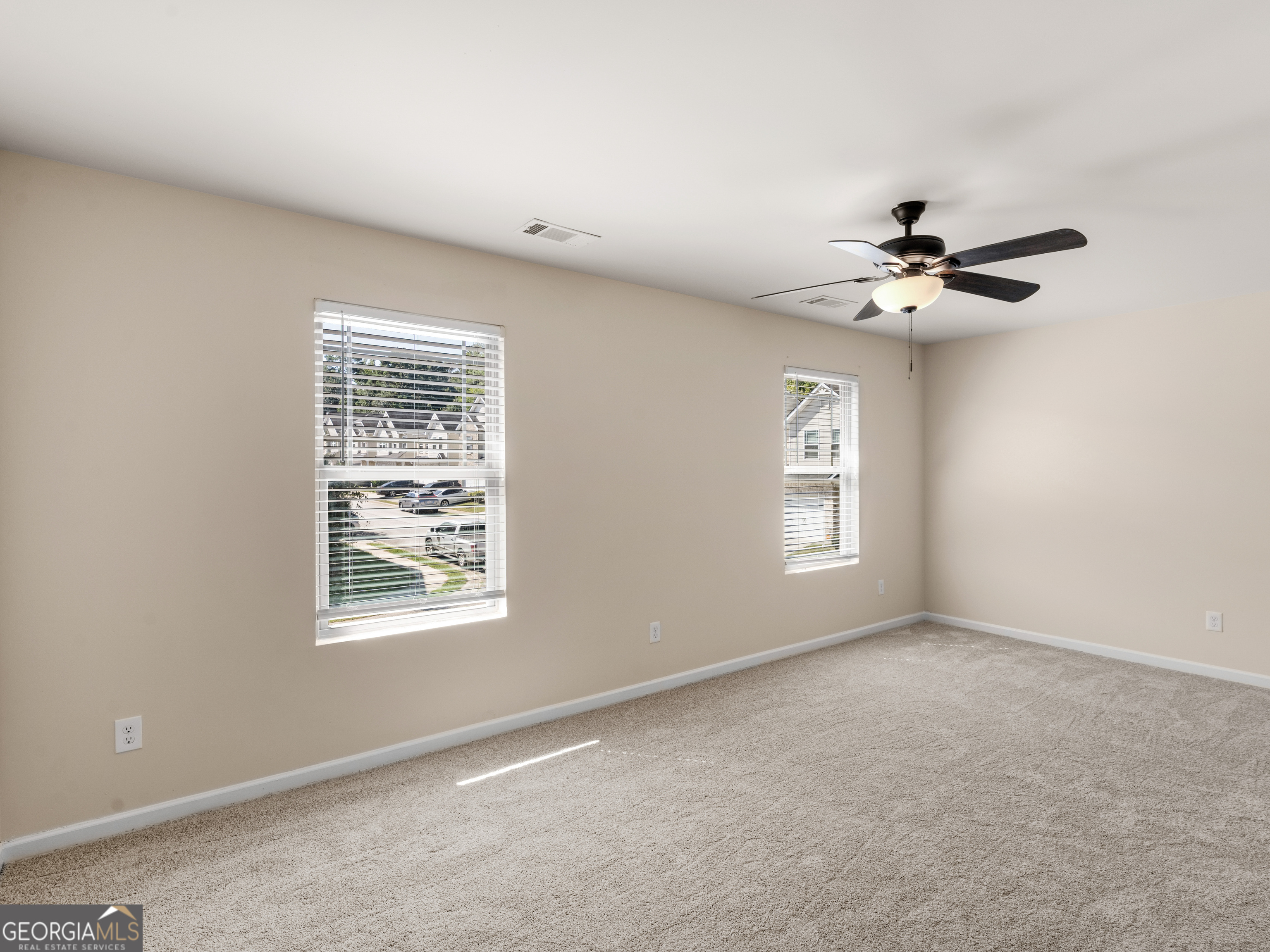 1244 Faye Court McDonough, GA 30253 - Photo 20 of 35 a view of an empty room with a window