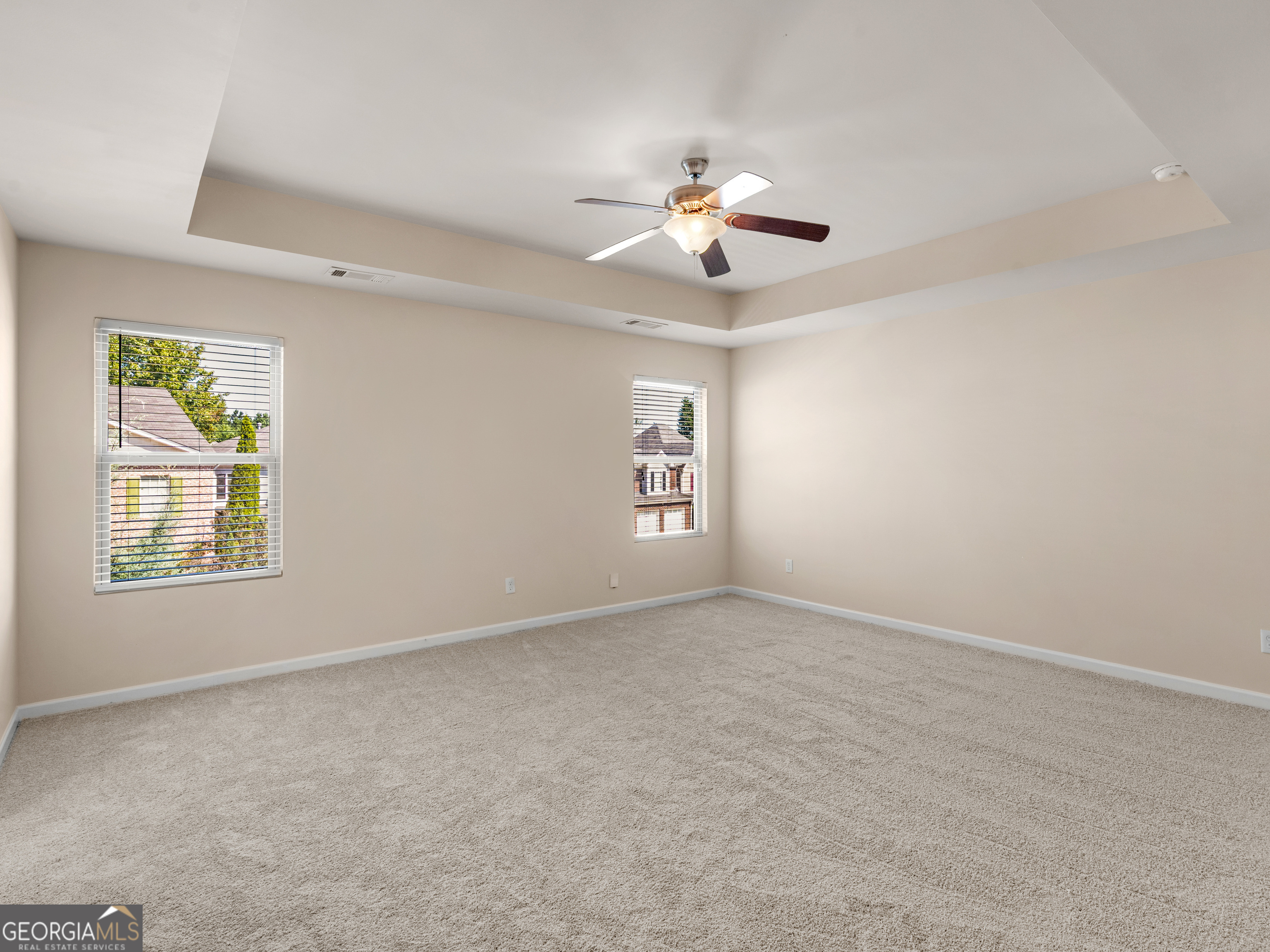 1244 Faye Court McDonough, GA 30253 - Photo 27 of 35 a view of an empty room with a window