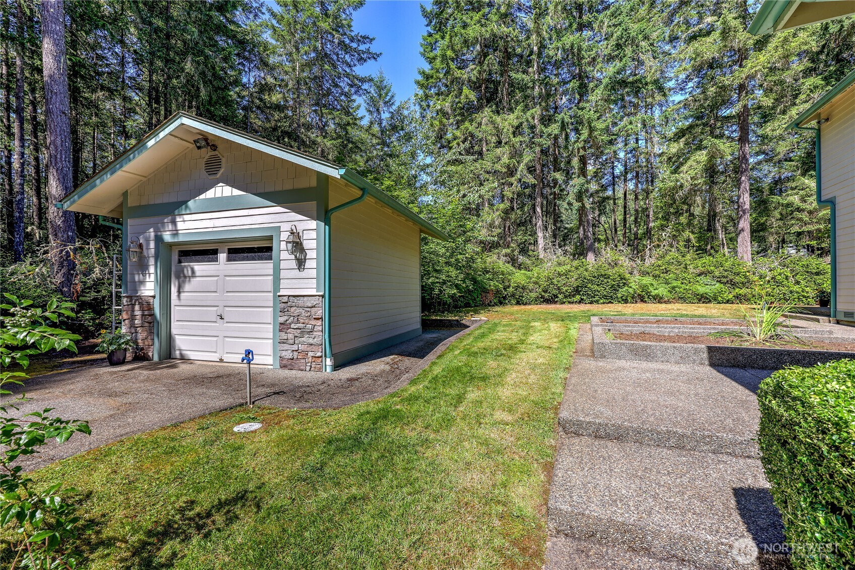 4354 Northwest Westgate Road Silverdale, WA 98383 - Photo 32 of 40 a front view of a house with garden