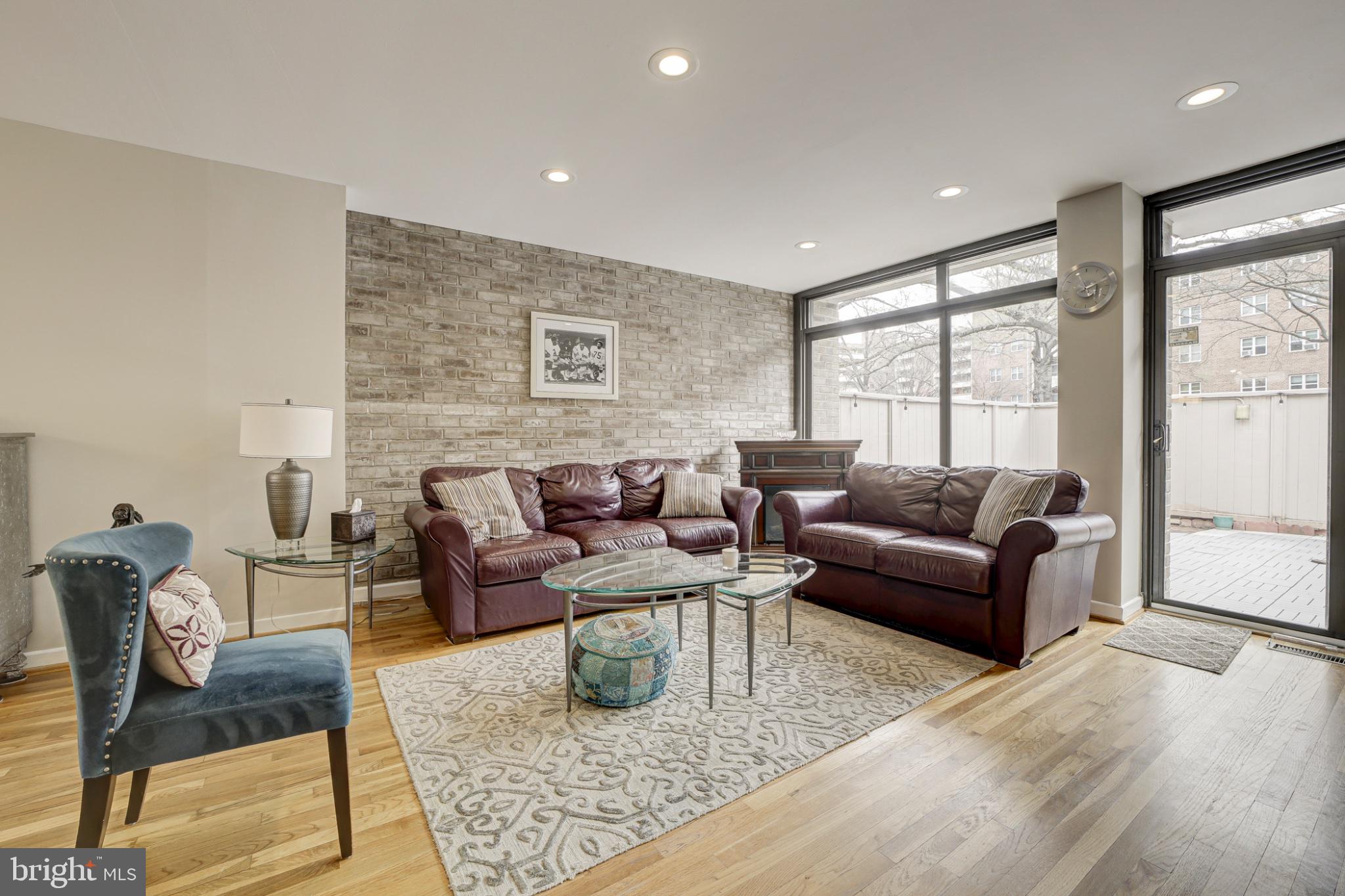 1273 Delaware Avenue Southwest Washington, DC 20024 - Photo 7 of 32 a living room with furniture wooden floor and a large window