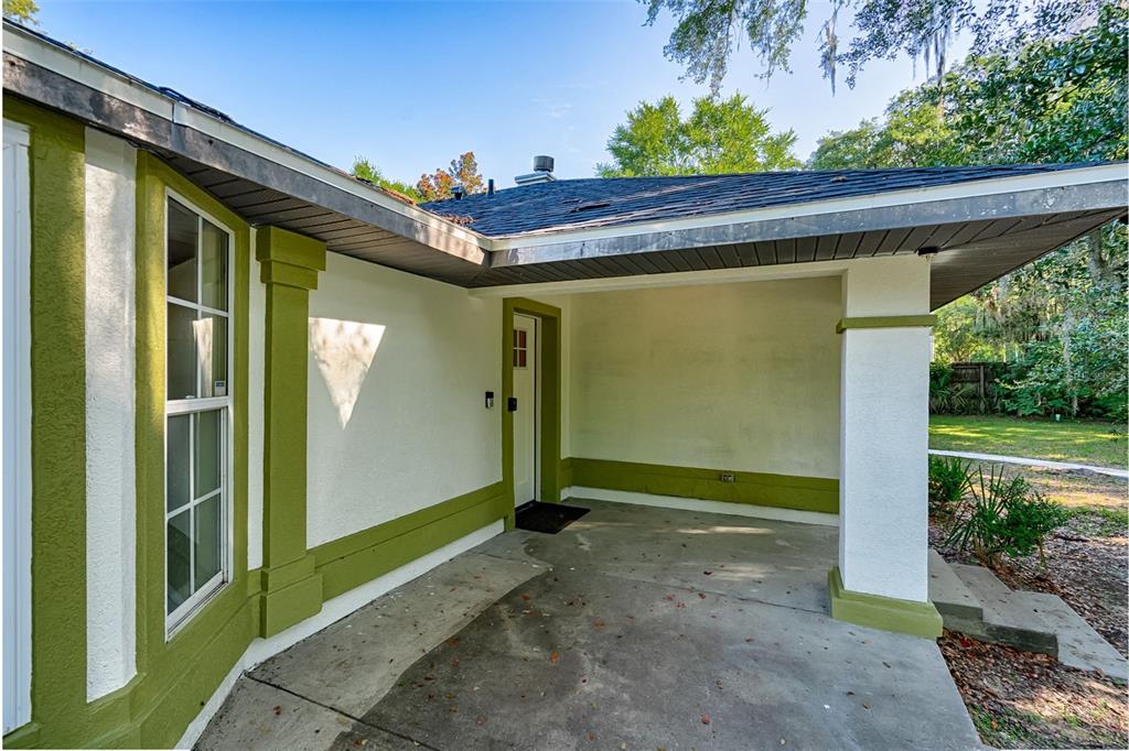3222 Southwest 27th Street Gainesville, FL 32608 - Photo 37 of 42 a view of outdoor space with deck