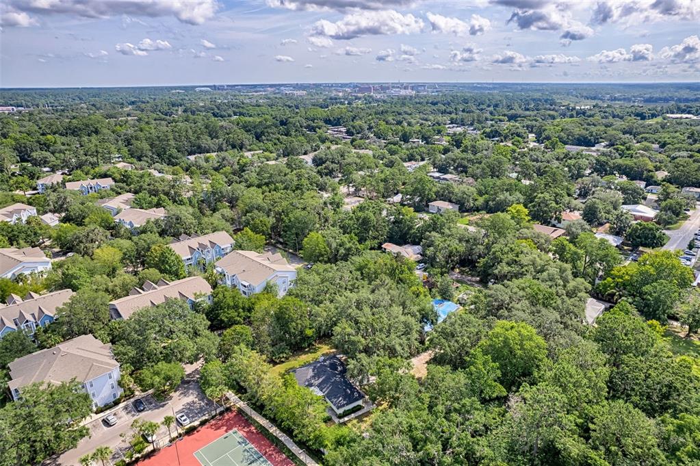 3222 Southwest 27th Street Gainesville, FL 32608 - Photo 42 of 42 an aerial view of a house with a yard and lake view