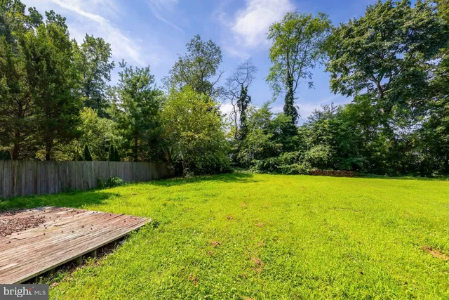 a view of a yard with an outdoor space
