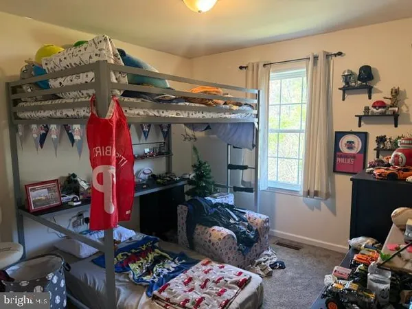 a room with furniture and a window
