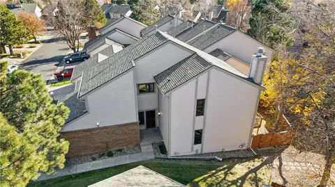 an aerial view of a house with a garden