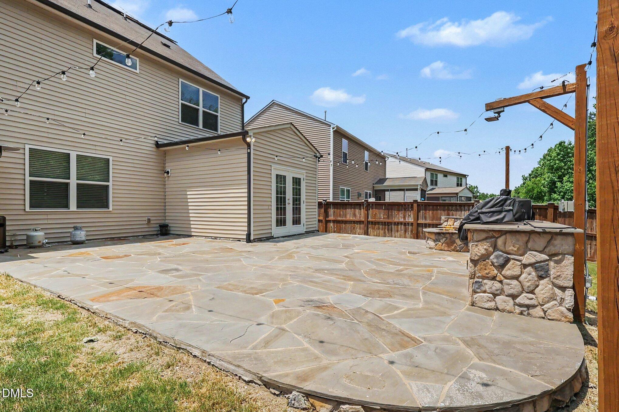 4366 Auburn Hills Drive Raleigh, NC 27616 - Photo 36 of 40 a view of a backyard of a house
