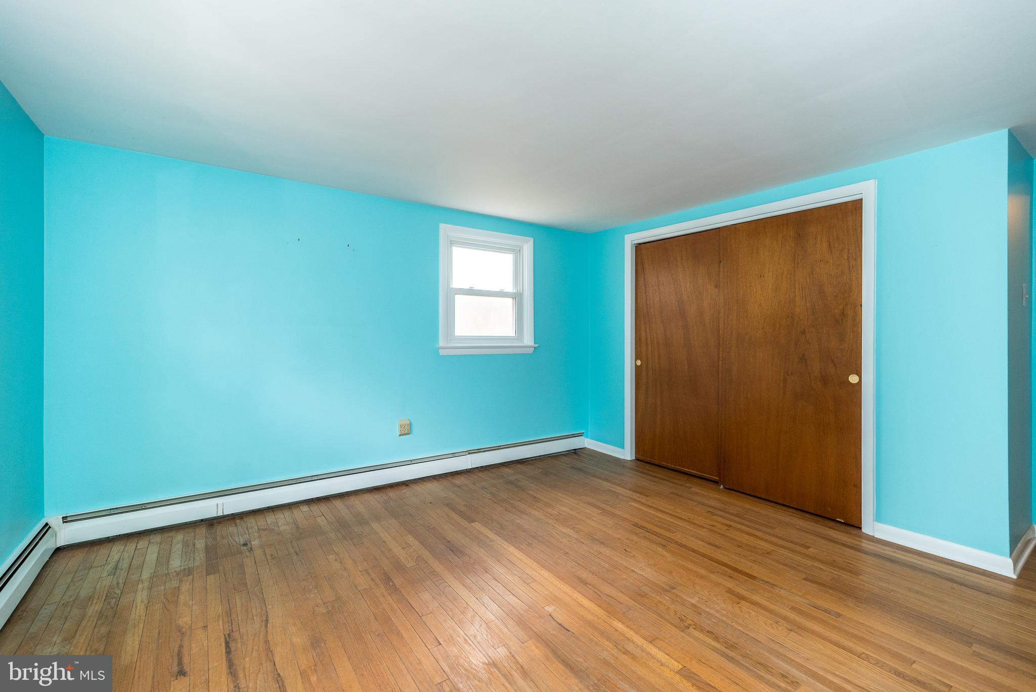 1962 Kepler Road Pottstown, PA 19464 - Photo 11 of 26 an empty room with wooden floor and windows