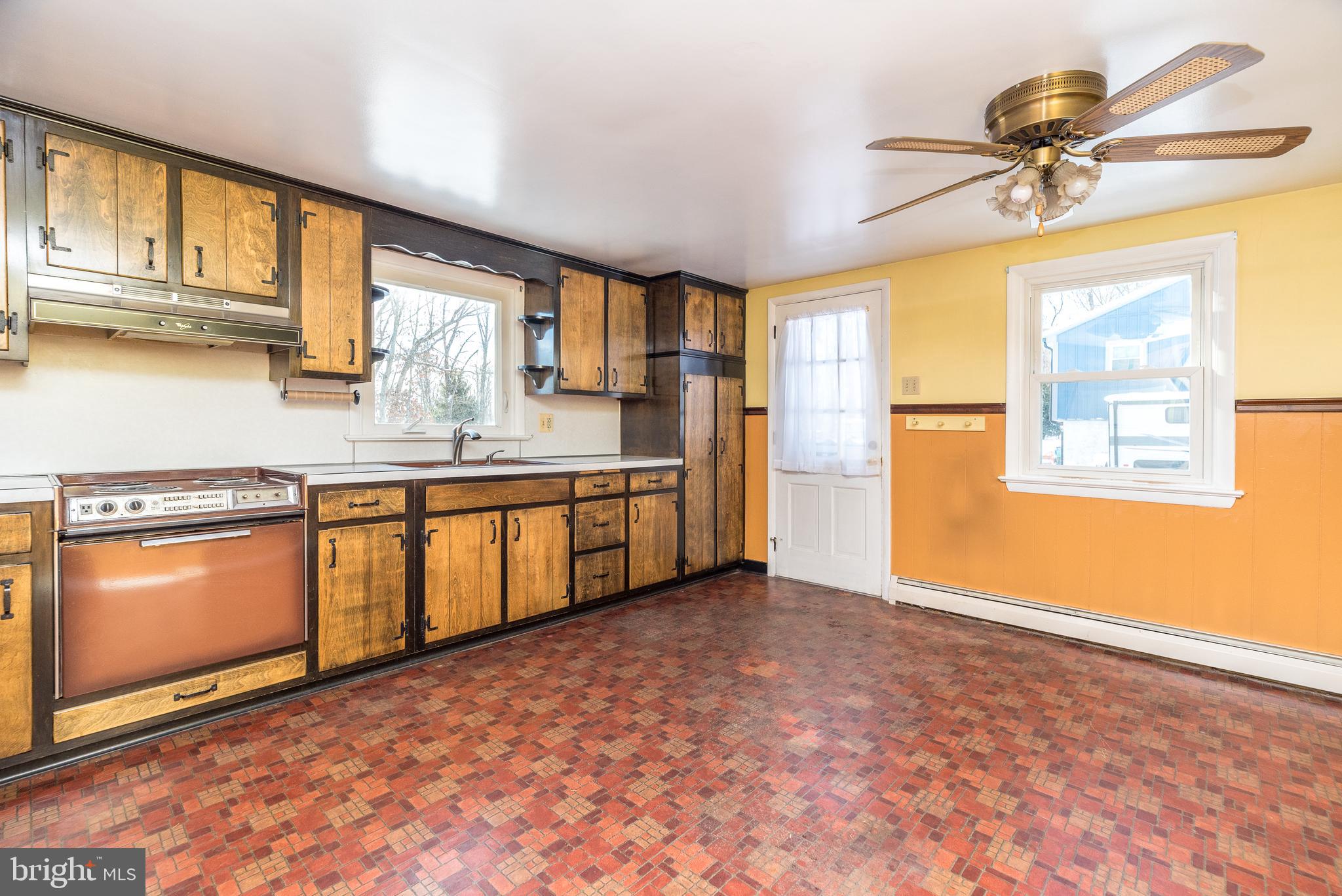 1962 Kepler Road Pottstown, PA 19464 - Photo 6 of 26 a kitchen with stainless steel appliances granite countertop a stove a sink and a refrigerator