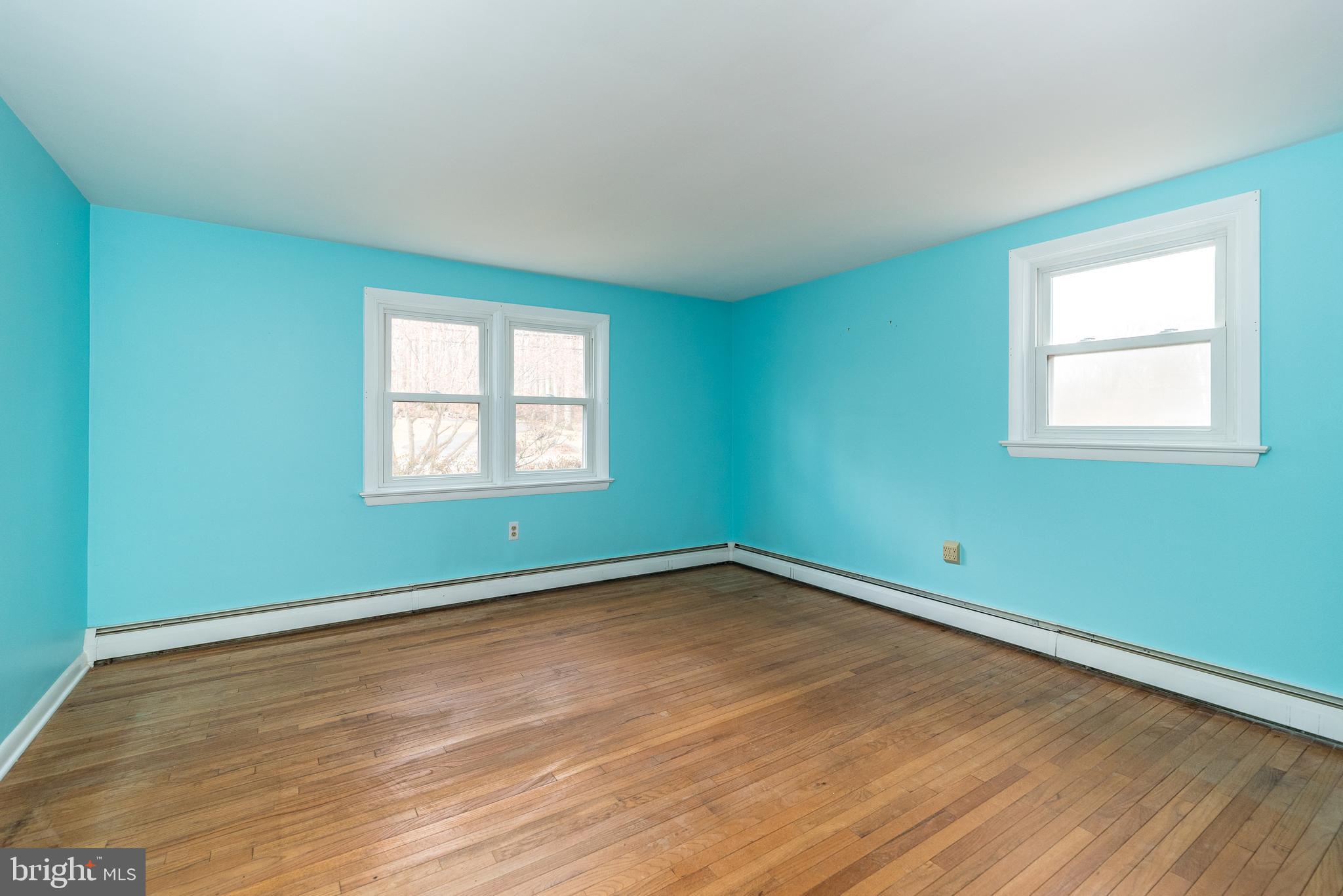 1962 Kepler Road Pottstown, PA 19464 - Photo 10 of 26 an empty room with wooden floor and windows