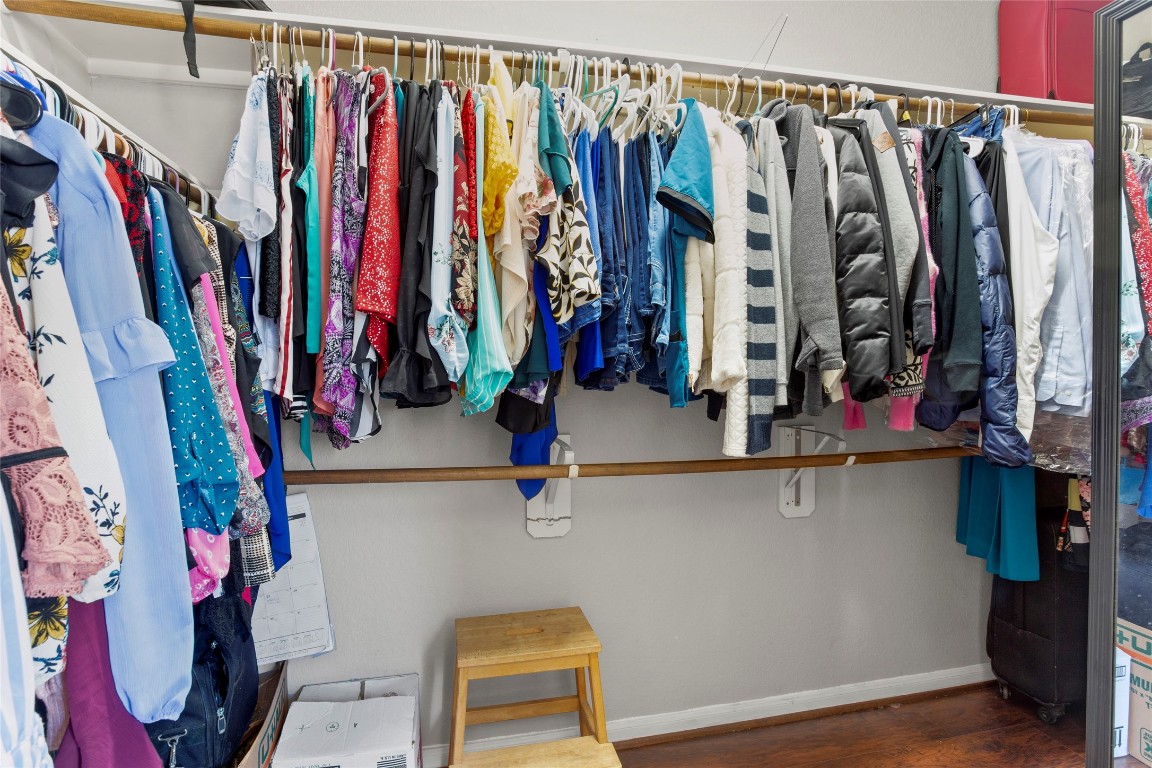 30 Supiro Drive Manvel, TX 77578 - Photo 17 of 30 a view of walk in closet with clothes and shoes