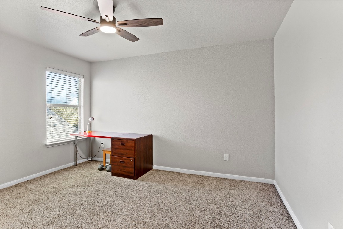 30 Supiro Drive Manvel, TX 77578 - Photo 19 of 30 an empty room with windows and fan