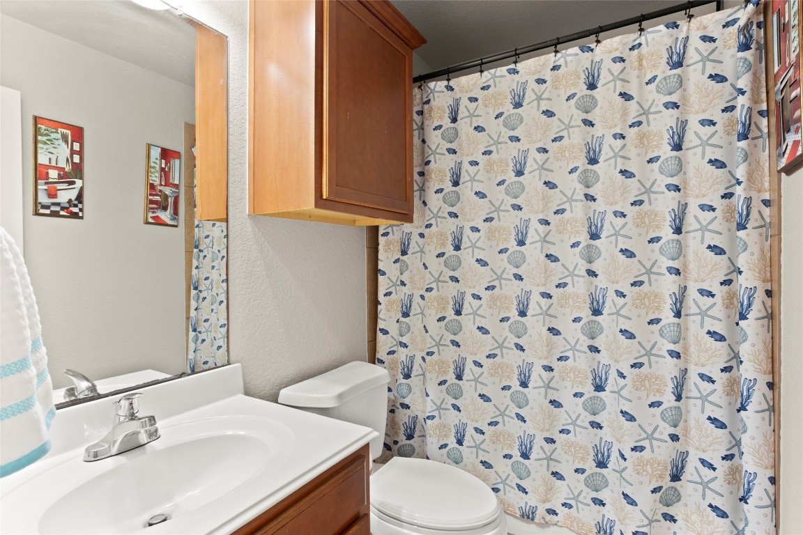 30 Supiro Drive Manvel, TX 77578 - Photo 20 of 30 a bathroom with a sink and a mirror