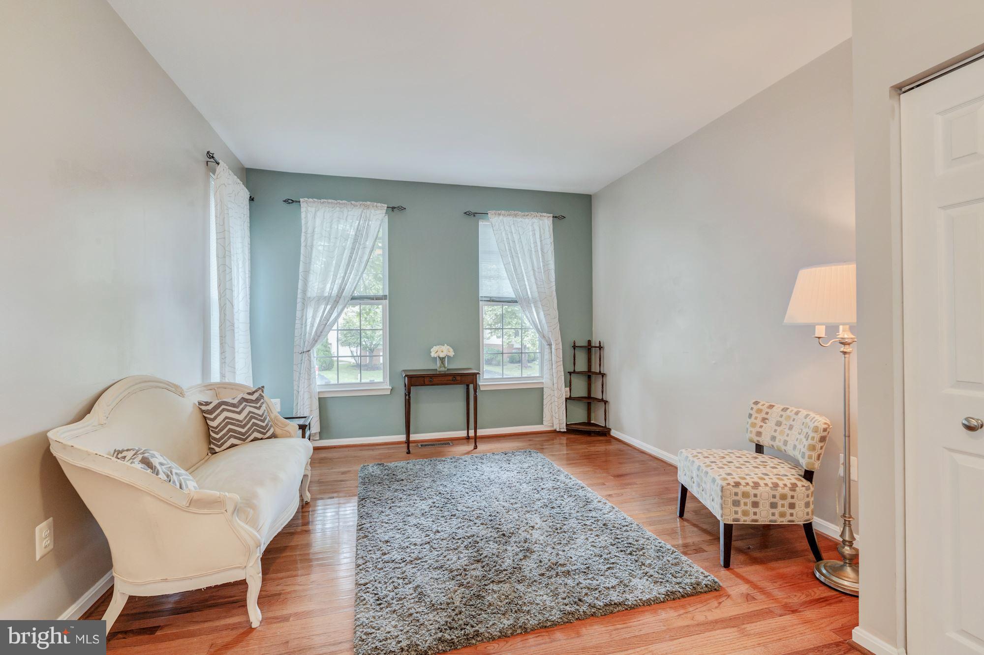8769 Partridge Run Way Bristow, VA 20136 - Photo 2 of 29 Enter the home into this light filled living room