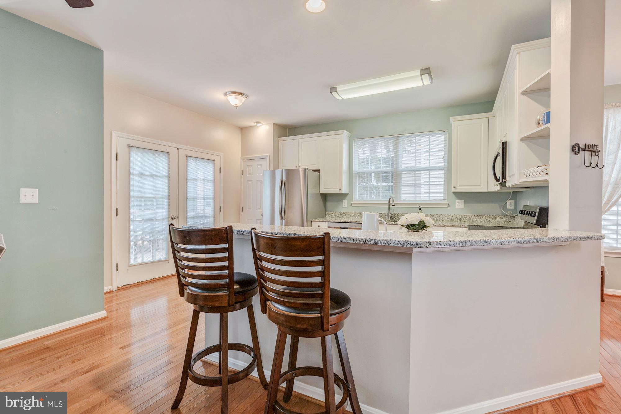 8769 Partridge Run Way Bristow, VA 20136 - Photo 6 of 29 Additional seating at breakfast bar