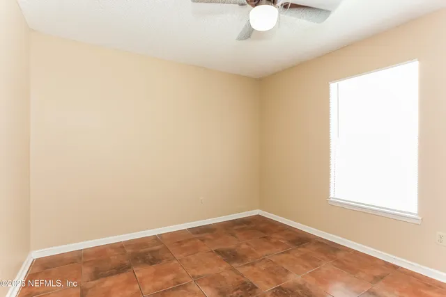 a view of a room with a window