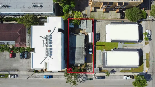 an aerial view of a city with lots of residential buildings