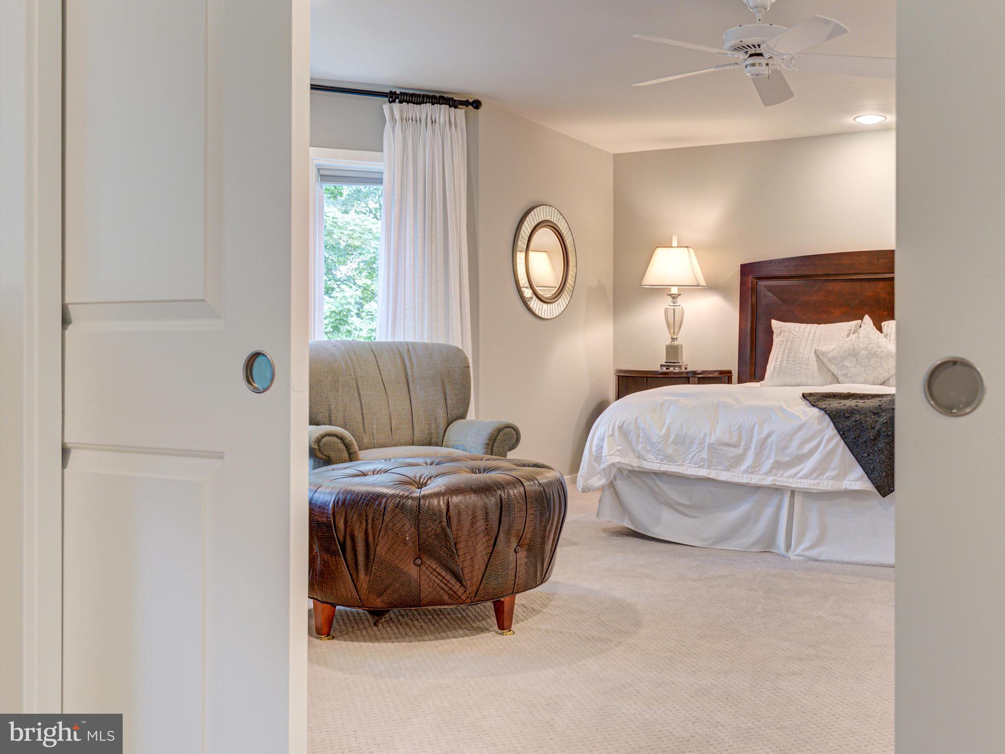 1422 Belcastle Court Reston, VA 20194 - Photo 40 of 85 Pocket doors separate Master and third bedroom