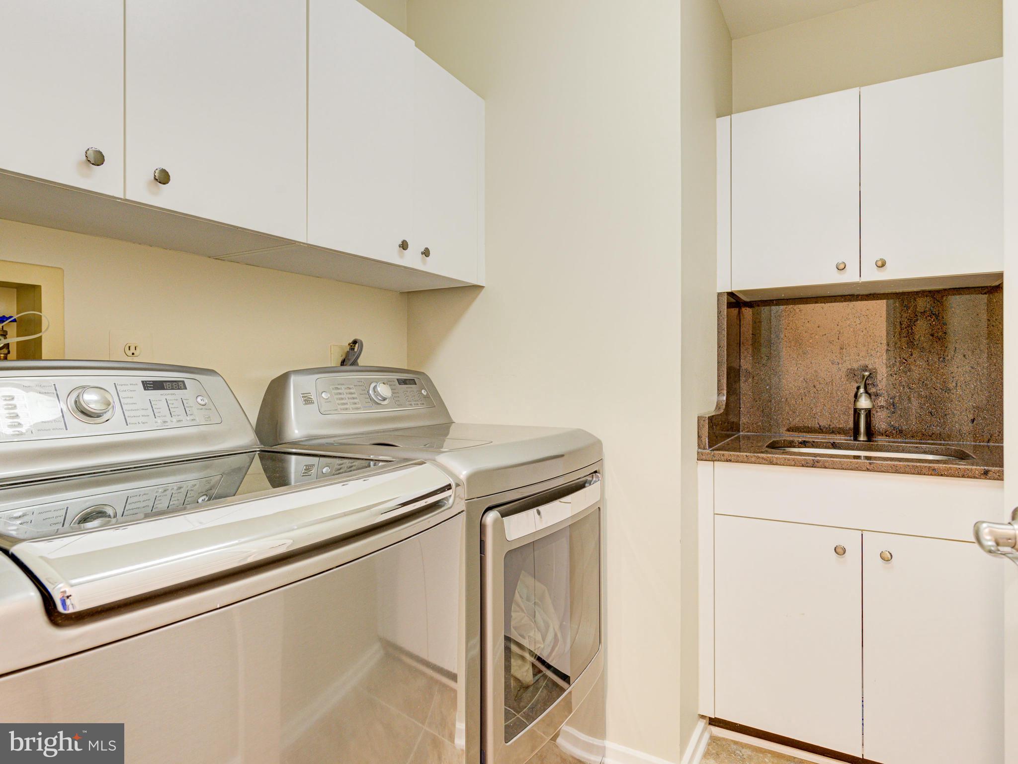 1422 Belcastle Court Reston, VA 20194 - Photo 52 of 85 Upper level laundry room with utility sink