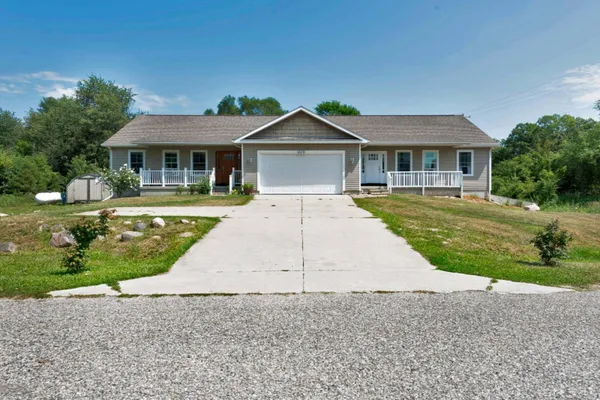 $674,900 | 879 Flat River Court Southeast, Lowell, MI 49331